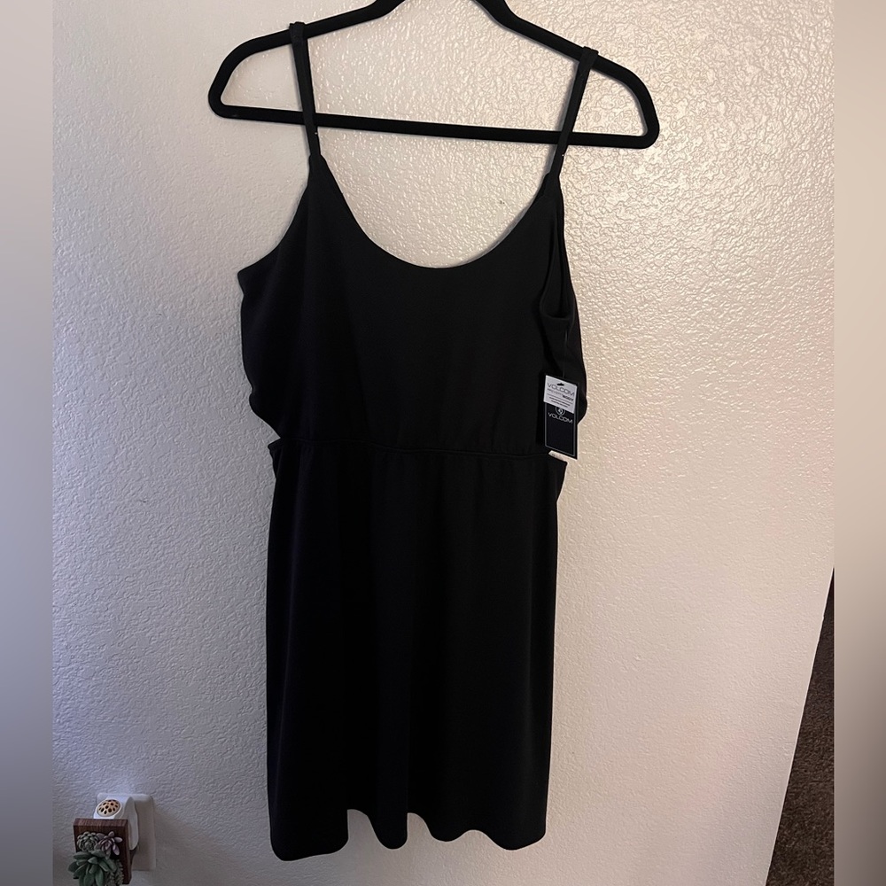 Volcom Black dress, mid thigh/ knee length. Brand new with tags